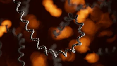 Visualisation of an RNA strand with glowing orange sections in the background